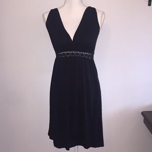 Beautiful black low cut lace dress with tie back
